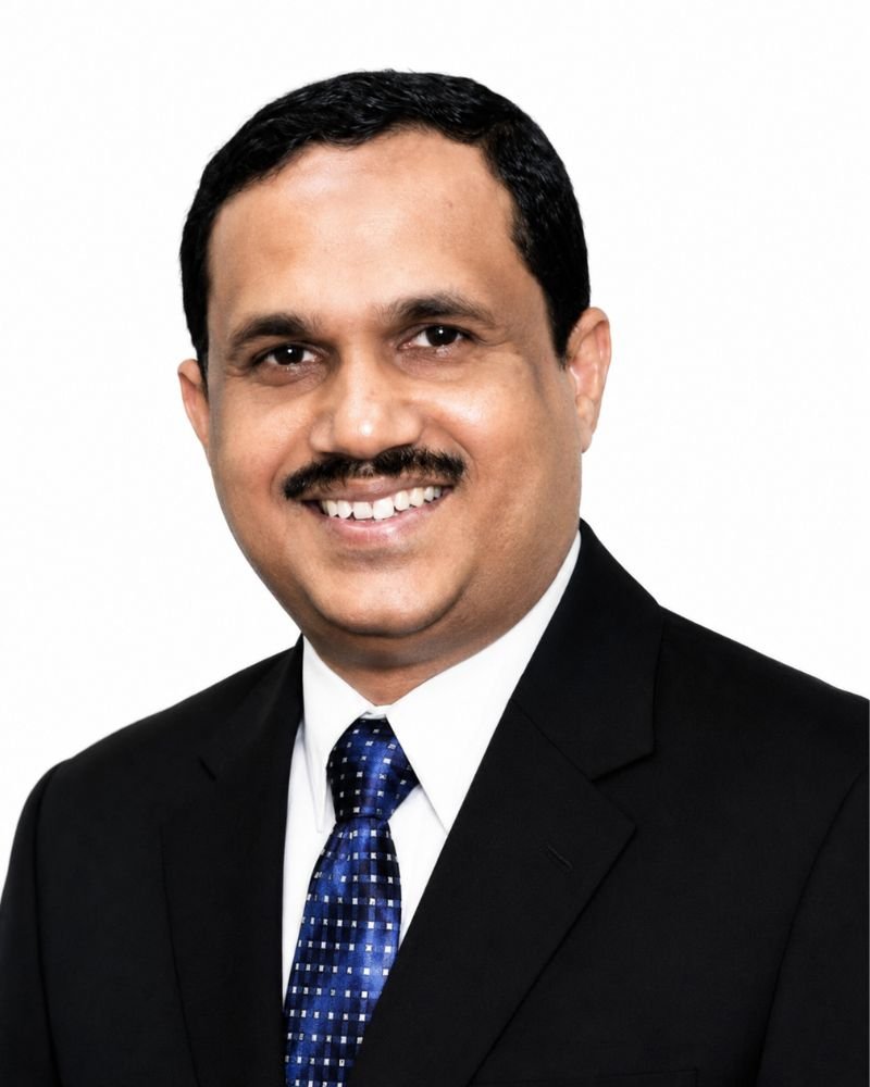 Dr Kader Mohiadeen